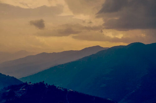 Roopkung Trek beginning - Golden sunset over Himalayan peaks in Lohajung