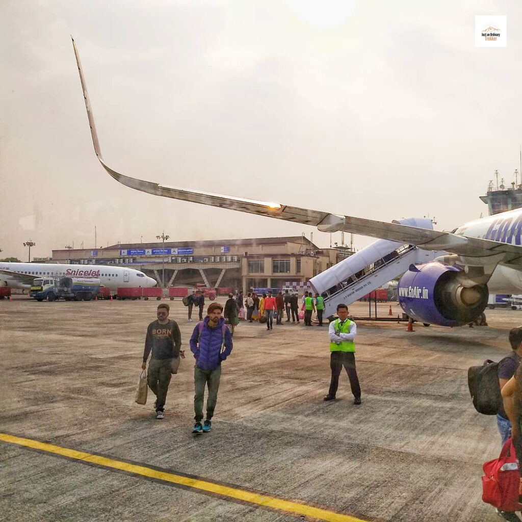Stepping out at Bagdogra Airport for the Sandakphu Trek, unaware of the Siliguri chaos that lay ahead.