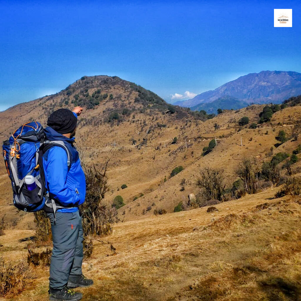 Standing on the way to Kalipokhri and trying to replicate the lakshya scene by pointing towards Everest which can be seen from far away!
