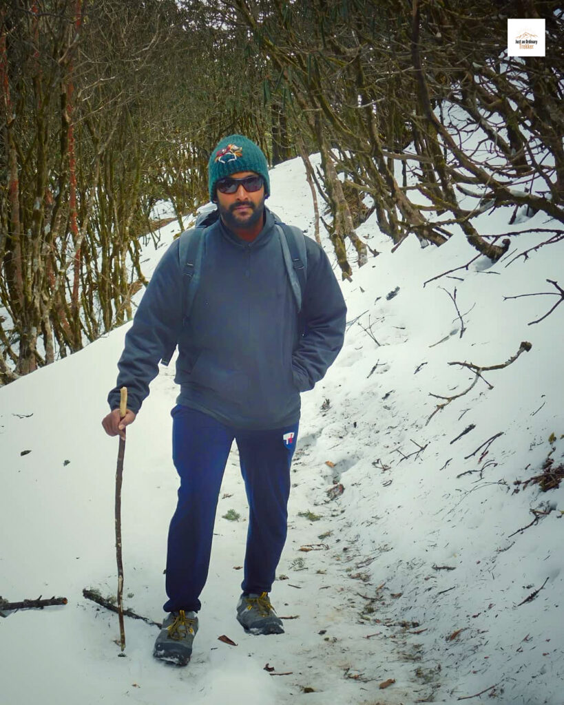 Ram, our super trekker from Tamil Nadu walking breezily past the snow trails from Sandakphu!